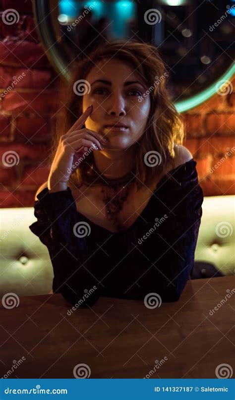 blonde girl posing in front of a brick wall stock image image of dance hipster 141327187