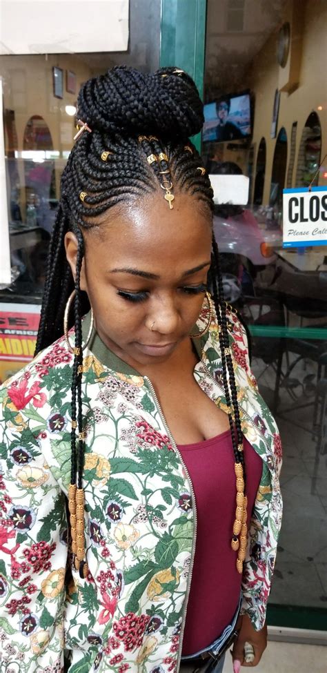 This sensational hairstyle has captured the hearts of black women around the world, who as you go, you need to add more synthetic hair to create larger braids. Fulani braid | Natural hair styles, African braids ...