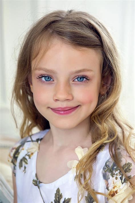 Portrait Of A Girl Seven Years Old With Blond Hair And White Dress Photograph By Elena Saulich