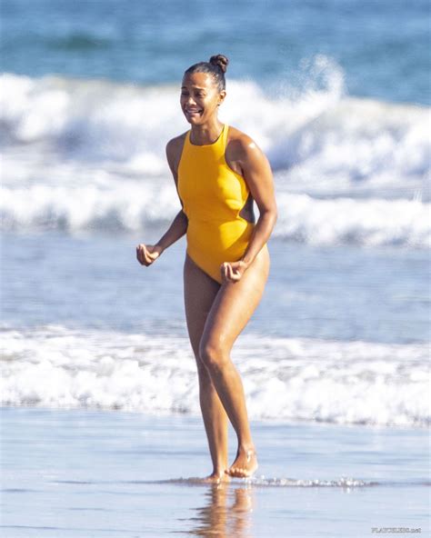 Zoe Saldana Relaxing In Tight Swimsuit On A Beach PlayCelebs Net