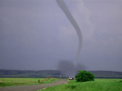 Tornado Touching Down By Country Road Tornadoes Wallpaper