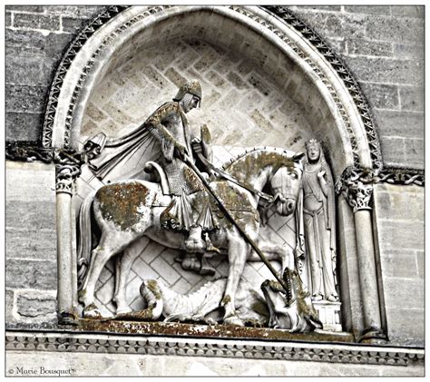 saint georges terrassant le dragon sur la façade de l égli… flickr