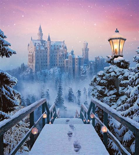 A Snow Covered Walkway Leading To A Castle In The Distance With Candles