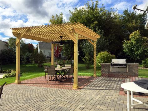 Custom Pergola Over Belgard Patio With Built In Grill Surround By