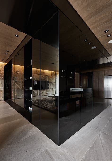 Black Acrylic Glass And Stone Form This Dark And Sophisticated Apartment Interior