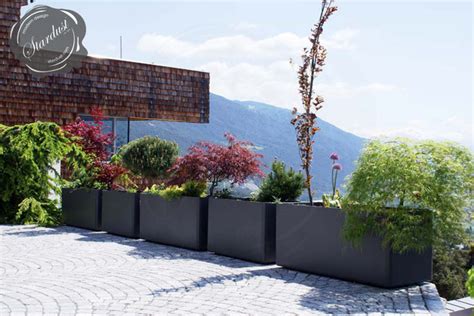 Modern Landscape And Patio Design With Large Modern Garden Planters
