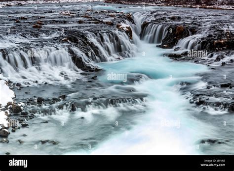 Beautiful Bruarfoss Waterfall With Turquoise Water In Winter South