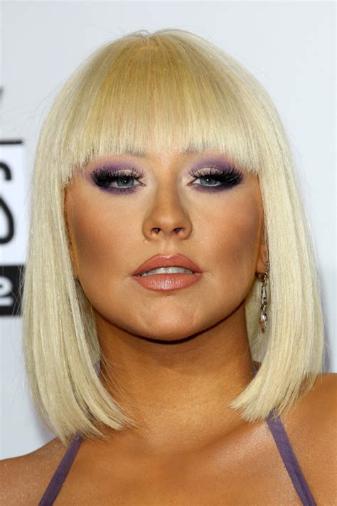 christina aguilera straight golden blonde blunt bangs bob hairstyle steal her style