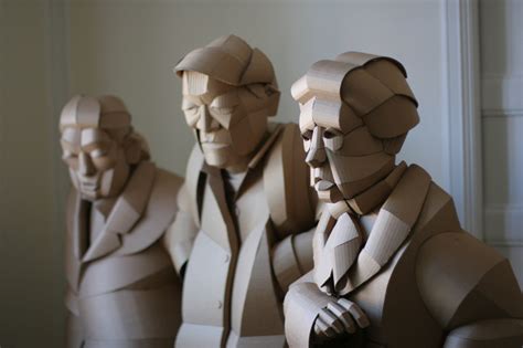 Warren King Uses Cardboard To Sculpt Villagers Of His Ancestral Home