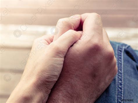 Two Hands Together A Man And A Woman Holding Hands Stock Photo