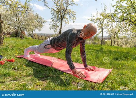 Aged Ordinary Man Go In For Sport At Home Bright Picture Of Real Workout Beginner Stand In