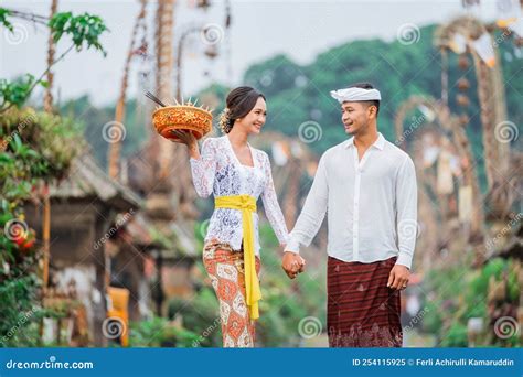 Balinese Men In Traditional Costume Bali Indonesia Ed