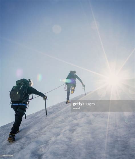 Climbers On A Snowy Slope High Res Stock Photo Getty Images