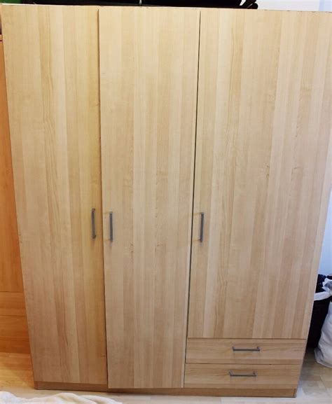 How many shelves are in an ikea wardrobe? IKEA KULLEN 3 door wardrobe with 2 drawers in beech colour ...