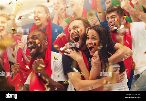Group Of Happy Fans Cheering For Their Team Victory Male And Female Models As Fans Of Football