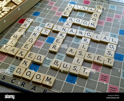 Scrabble Letters Spelling Financial Doom Stock Photo Alamy