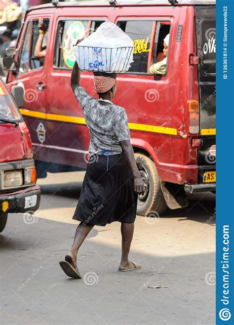 unidentified ghanaian woman carries a basket on her head at the editorial stock image image of