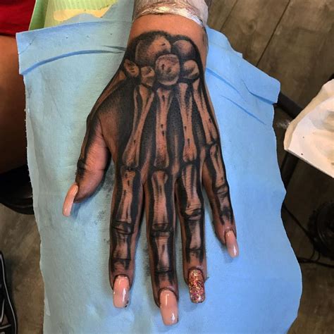 23 Skeleton Hand Tattoos For Everyone In 2021 Small Tattoos And Ideas