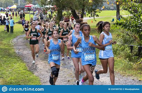 Girls Running In A 5k Race At Bowdoin Park Editorial Photography