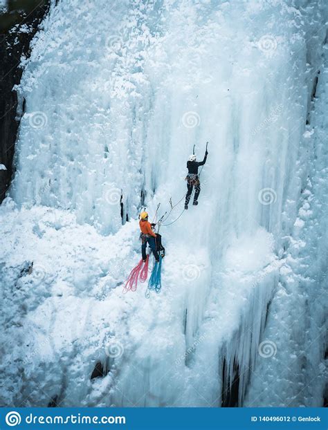Ice Climbing On A Frozen Waterfall Editorial Photography Image Of