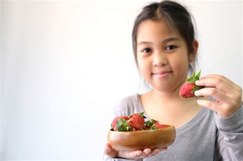 premium photo girls with fresh red strawberries healthy food