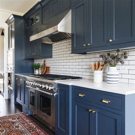 Navy Blue Kitchen With Natural Brass Finishings Photo By