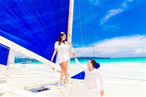Young Beautiful Couple Having Fun On A Tropical Beach Tropical Stock