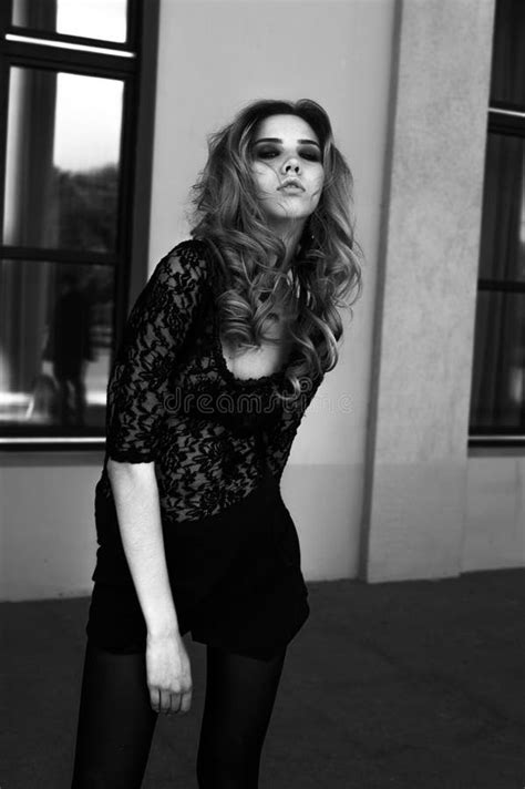 Gorgeous Model Girl In A Lace Body Posing Outdoors Black And White