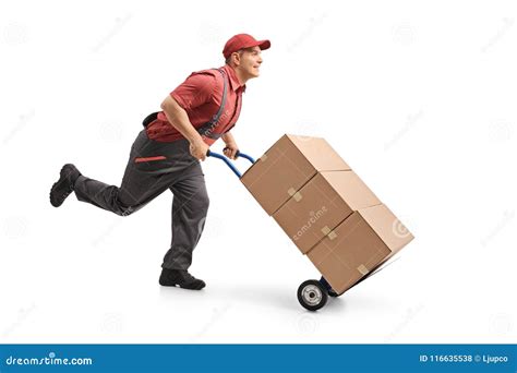 Mover Running And Pushing A Hand Truck Loaded With Boxes Stock Photo