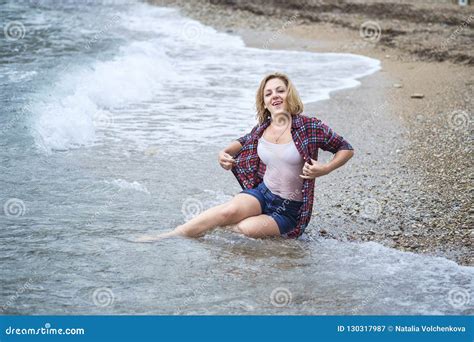 Wet Girl Sitting In The Water On The Sea Beach Stock Image Image Of Hair Body 130317987