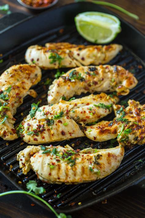 This cilantro lime chicken is wonderfully versatile, healthy and prep ahead so you so you can throw your marinated cilantro lime chicken on the grill or stove the second you are craving dinner. Grilled Chili Cilantro Lime Chicken | Gimme Delicious