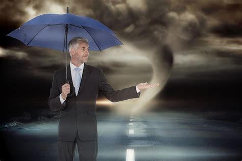 Premium Photo Happy Businessman Holding Umbrella Against Stormy Sky