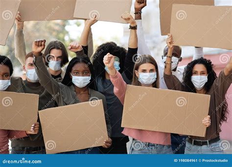 Young Mad People Making Riot Holding Empty Placards Stock Image