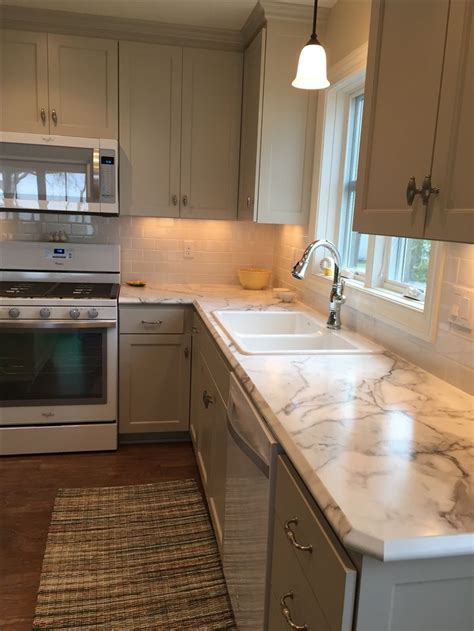 When you don't live in stone countertop house, laminate kitchen countertops are a great solution. Formica FX 180 Calcutta Marble with Ideal Edge | Our New ...