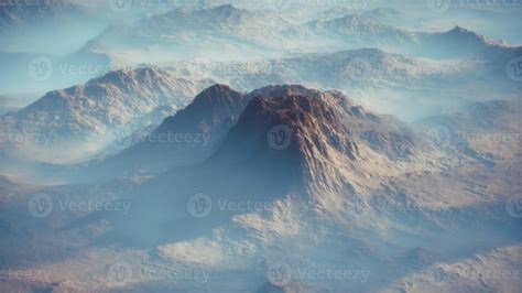 Distant Mountain Range And Thin Layer Of Fog On The Valleys 5839841