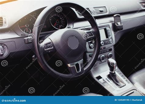 Modern Luxury Car Interior Steering Wheel Shift Lever And Dashboard