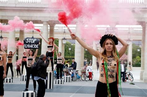 Topless Femen Activists In Paris Stage Naked Protest Again Male