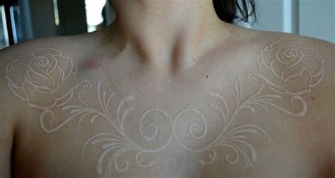 White Ink Roses Tattoo On Chest Tattooimagesbiz