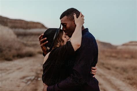 Mixed Race Couple Laughing At Sunset By Stocksy Contributor Luke Liable Stocksy