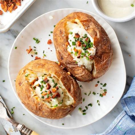 Wrapping the potatoes in foil actually steams them instead of baking them because it traps all the moisture inside. Bake Potatoes At 425 / Fail Proof Baked Potato Recipe Lauren S Latest : I might try boiling some ...