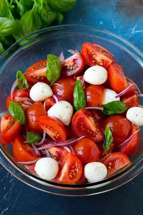 Tomato Salad With Fresh Mozzarella Cheese Red Onion And Basil
