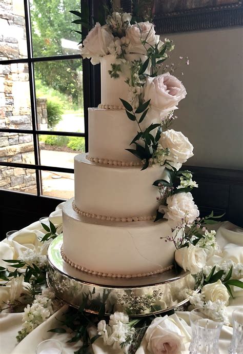 Smooth Iced Simple Elegant Buttercream Wedding Cake Garnished With