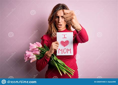 Beautiful Brunette Woman Holding Love Mom Message And Tulips Celebrating Mothers Day Annoyed And