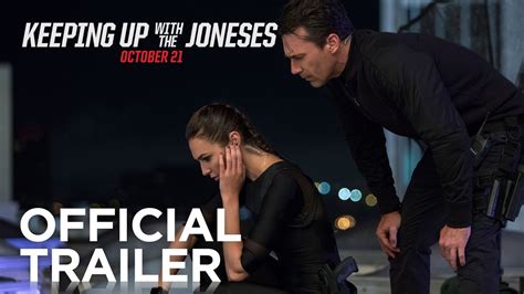 Gal Gadot Jon Hamm Are Typical Suburban Spies In Keeping Up With The