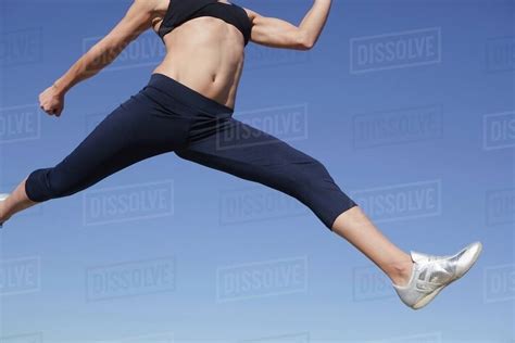 Woman Leaping Stock Photo Dissolve