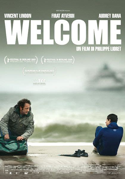 A Movie Poster For Welcome With Two People Sitting On The Beach Next To