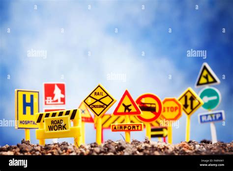 A Bunch Of Signs Stuck In Gravel Stock Photo Alamy