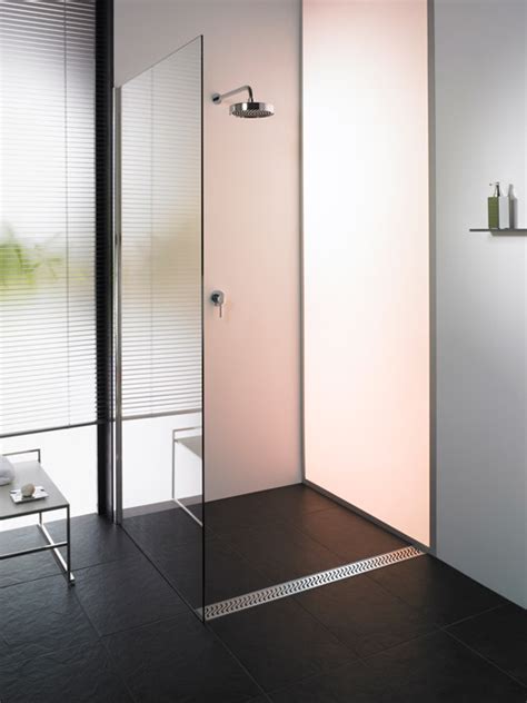 The mud of the shower floor is installed with a level perimeter and slopped to the drain with a pitch of a ¼ per foot. Phinney Modern: Some Small Topics