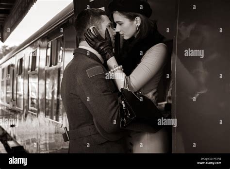Vintage Couple Handsome Man In Uniform Kissing Goodbye His Lover On Railway Station Platform