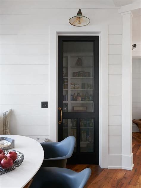Door ideas kitchen ideas m pantry ideas. Cottage kitchen boasts a shiplap wall fitted with a black ...